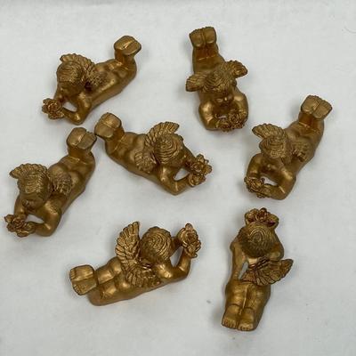 7 pc lot of golden angels laying on their tummies reading