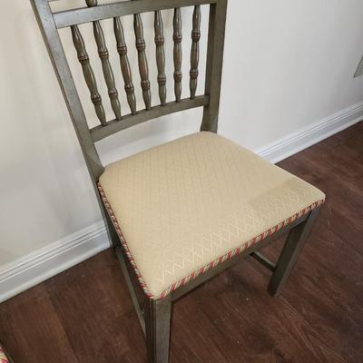 Set of six dining chairs.