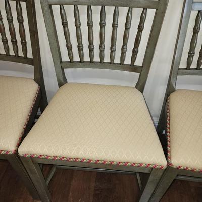 Set of six dining chairs.
