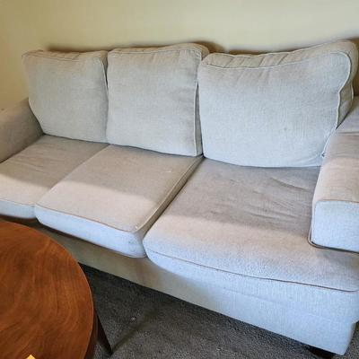 Beige linen sofa