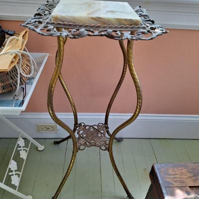 Wrought iron table with marble insert