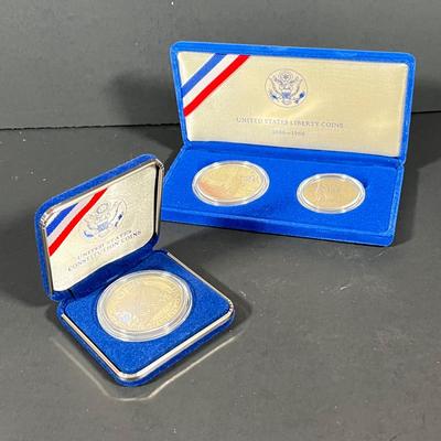 LOT 123: United States 1986 Silver Liberty Dollar and Clad Half Dollar & 1987 Silver Constitution Proof Dollar Coins