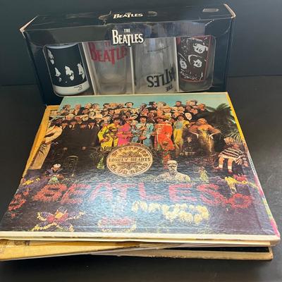 LOT 143: The Beatles Vintage Vinyl Record Albums and Collectible Pint Glass Set
