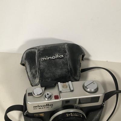 LOT 199: Vintage Minolta Hi-matic F 35mm Film Camera, Promaster 5900 External Flash & More Photography Accessories