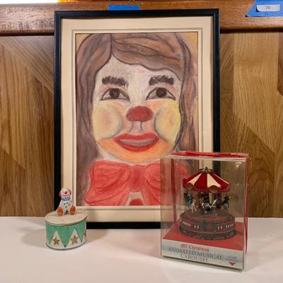 LOT 224: Napco Clown Jewelry/Trinket Jar, Mr. Christmas Animated Musical Carousel, & Framed Chalk Pastel Clown Art