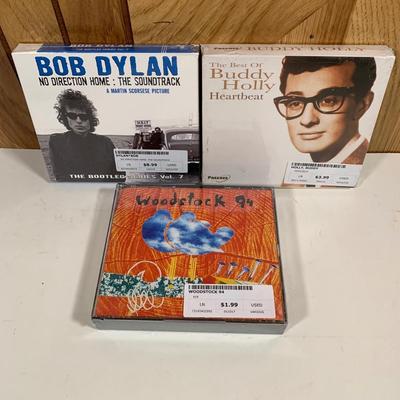 LOT 230: CD Collection: Billy Joel, Lenny Kravits, Toadies, Elvis, Poison, Bob Dylan, Buddy Holly, & More