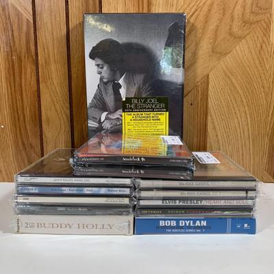 LOT 230: CD Collection: Billy Joel, Lenny Kravits, Toadies, Elvis, Poison, Bob Dylan, Buddy Holly, & More
