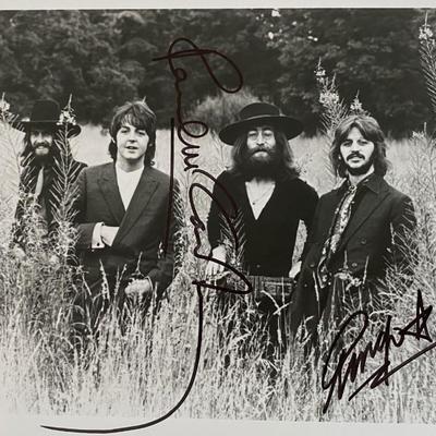 The Beatles rare band photo. GFA Authenticated