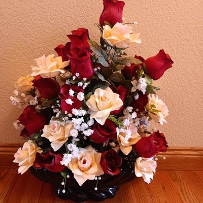 Black framed - glass topped end table with a beautiful bouquet of faux Roses.