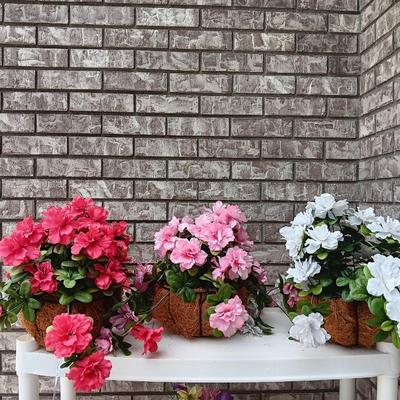 Three Faux flowers in metal mesh hanging baskets - flowers can be removed