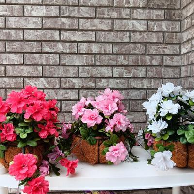 Three Faux flowers in metal mesh hanging baskets - flowers can be removed
