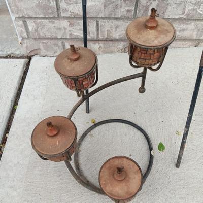 Two hanging mosquito votive lanterns and a 4 Arm Candelabra Oil Lamp on Cast Iron Stand Outdoor Indoor