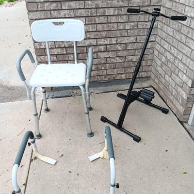 Adjustable height Shower chair with arm and leg exercise pedal and rowing machine.