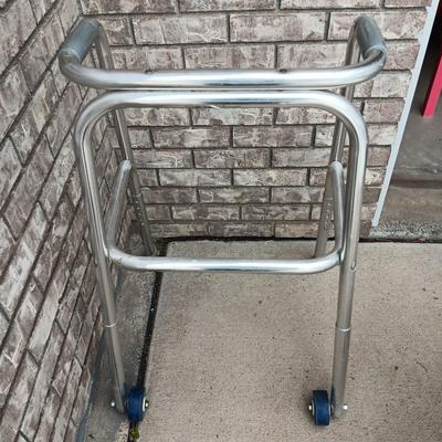 Adjustable height shower chair with adjustable height mobility walker