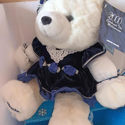 Collectible annual Christmas bear plush and penguin Millennial years.