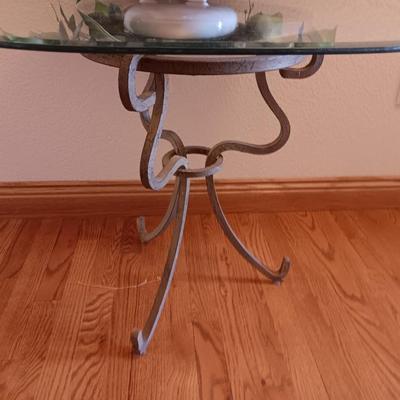 Metal base glass topped end / accent table with faux floral arrangement in a Decorative pot