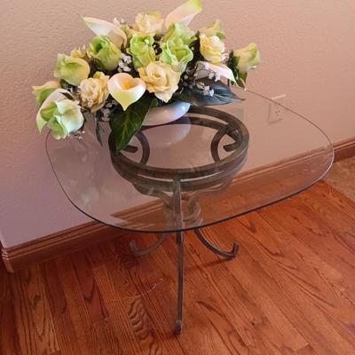 Metal base glass topped end / accent table with faux floral arrangement in a Decorative pot