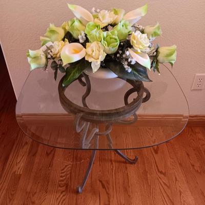Metal base glass topped end / accent table with faux floral arrangement in a Decorative pot