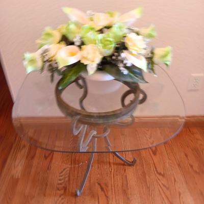 Metal base glass topped end / accent table with faux floral arrangement in a Decorative pot