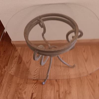 Metal base glass topped end / accent table with faux floral arrangement in a Decorative pot