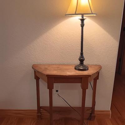 Antique wooden flat backed entry-way table with electric black accent lamp