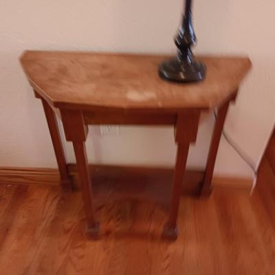 Antique wooden flat backed entry-way table with electric black accent lamp