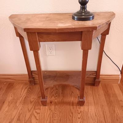 Antique wooden flat backed entry-way table with electric black accent lamp