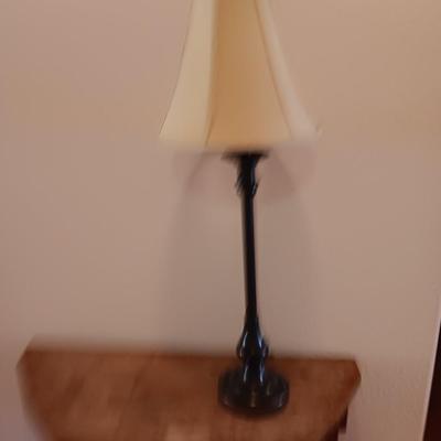 Antique wooden flat backed entry-way table with electric black accent lamp