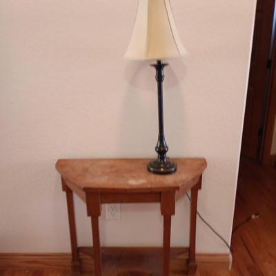 Antique wooden flat backed entry-way table with electric black accent lamp