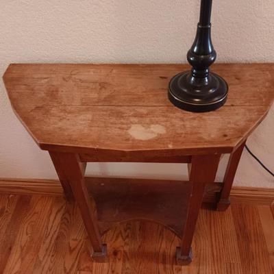 Antique wooden flat backed entry-way table with electric black accent lamp