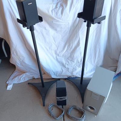 TWO sets of surround sound speakers with 2 stands - Panasonic & Sony with Subwoofers