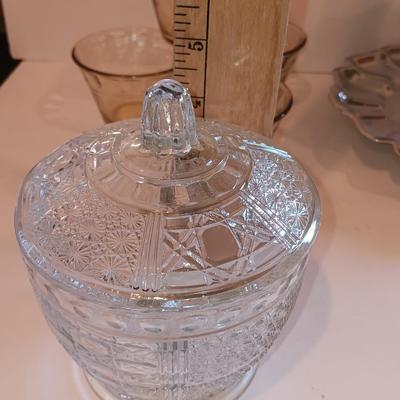 Vintage glass lidded candy dish - 8 amber glass custard cups and a silver-colored tiered platter.