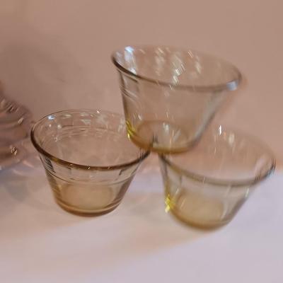 Vintage glass lidded candy dish - 8 amber glass custard cups and a silver-colored tiered platter.