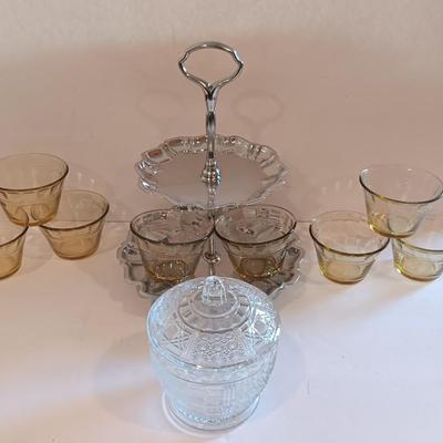 Vintage glass lidded candy dish - 8 amber glass custard cups and a silver-colored tiered platter.
