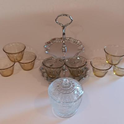 Vintage glass lidded candy dish - 8 amber glass custard cups and a silver-colored tiered platter.