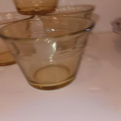 Vintage glass lidded candy dish - 8 amber glass custard cups and a silver-colored tiered platter.