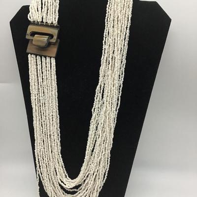 Multi strand Glass seed necklace. Beautiful. Wood style Latching Hook