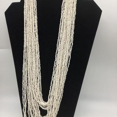 Multi strand Glass seed necklace. Beautiful. Wood style Latching Hook