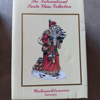 Numbered Thomas Kincade Santa with Santa's from around the world figures