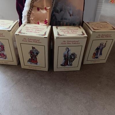 Numbered Thomas Kincade Santa with Santa's from around the world figures