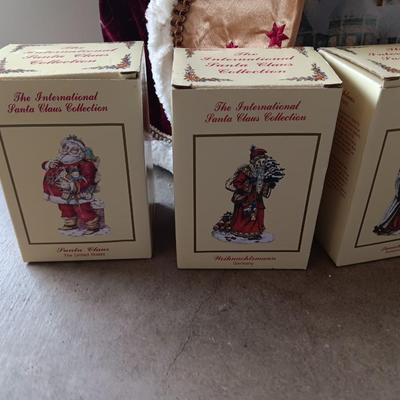 Numbered Thomas Kincade Santa with Santa's from around the world figures