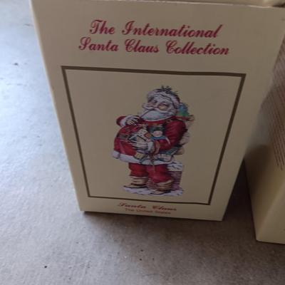 Numbered Thomas Kincade Santa with Santa's from around the world figures