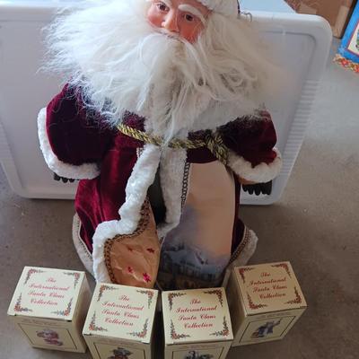 Numbered Thomas Kincade Santa with Santa's from around the world figures