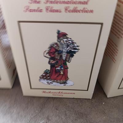 Numbered Thomas Kincade Santa with Santa's from around the world figures