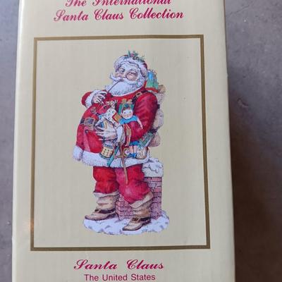 Numbered Thomas Kincade Santa with Santa's from around the world figures