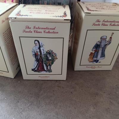 Numbered Thomas Kincade Santa with Santa's from around the world figures