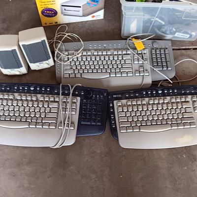 Assortment of computer keyboards and drives and other Computer accessories