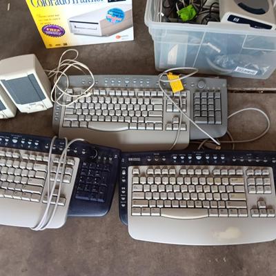 Assortment of computer keyboards and drives and other Computer accessories