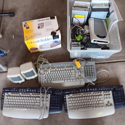 Assortment of computer keyboards and drives and other Computer accessories