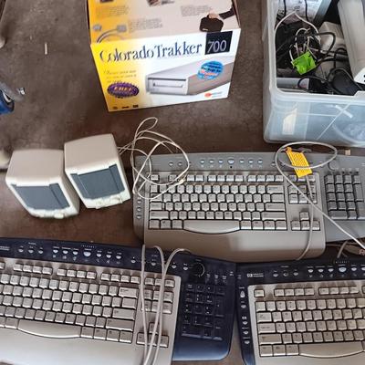 Assortment of computer keyboards and drives and other Computer accessories